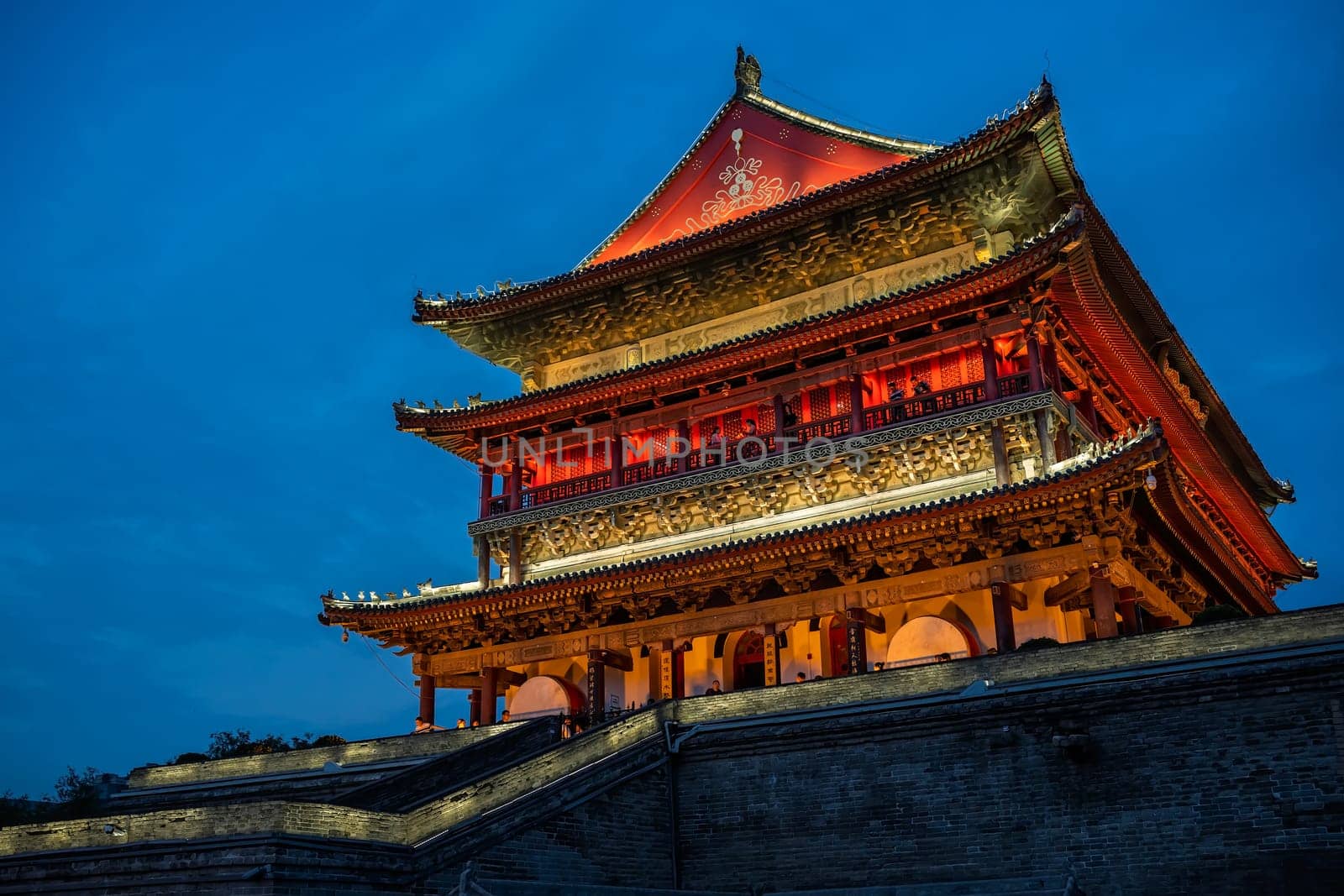 Xian, China -  July 2019 : Xian Bell Drum Tower beautifully lit and illuminated at night, Shaaxi Province