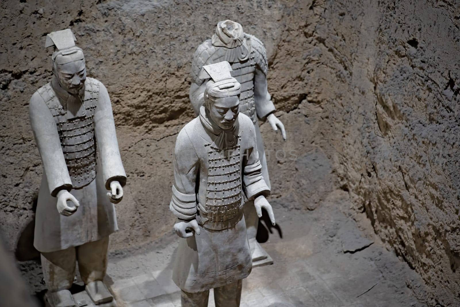 Xian, China -  July 2019 :  Standing clay soldiers forming part of an army of terracota warriors, created during the reign of first chinese emperor Qin Shi Huang Di, Shaanxi Province