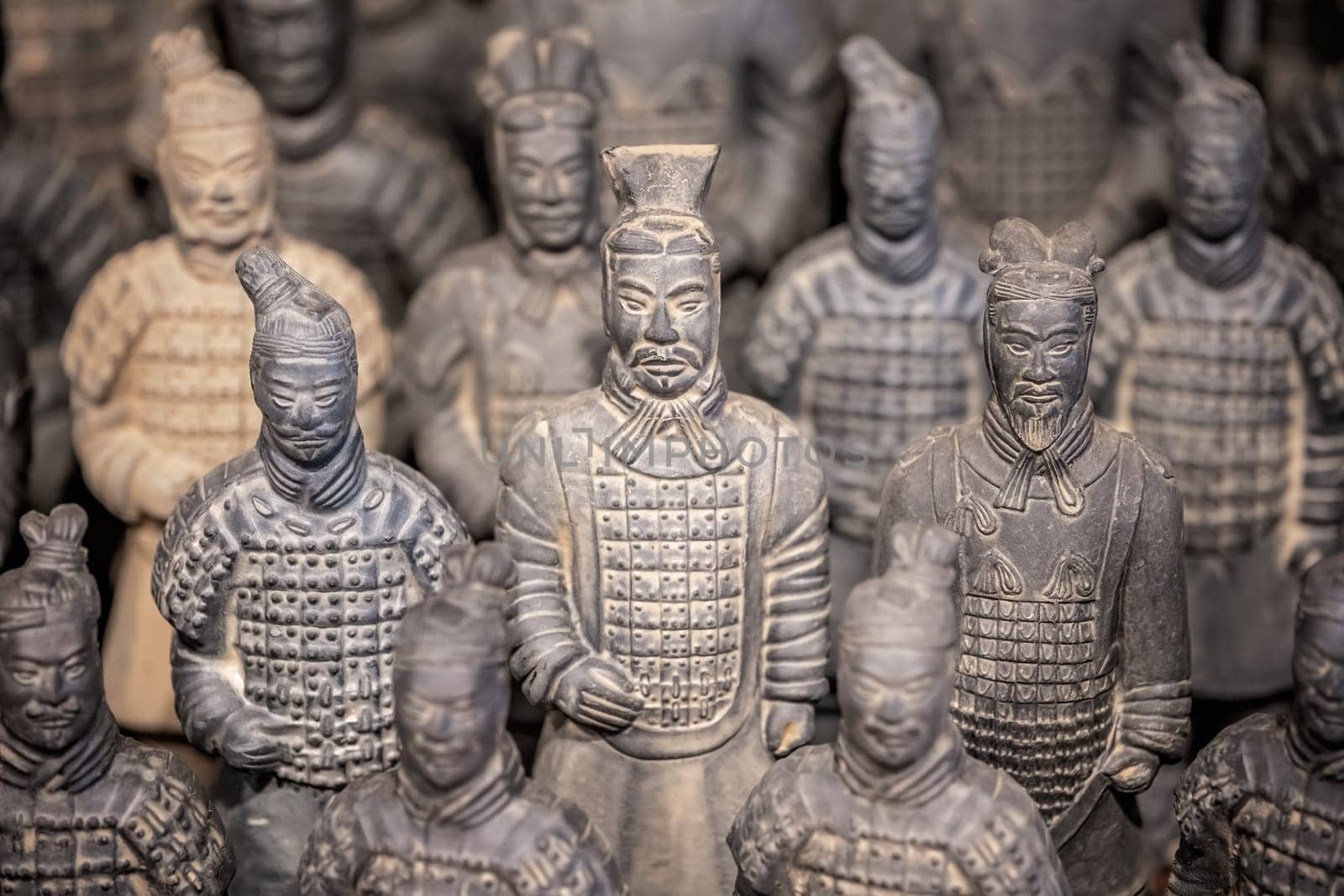 Xian, China -  July 2019 :  Souvenir mini small figurines of the clay soldiers of the army of terracota warriors for sale in a gift shop, Shaanxi Province