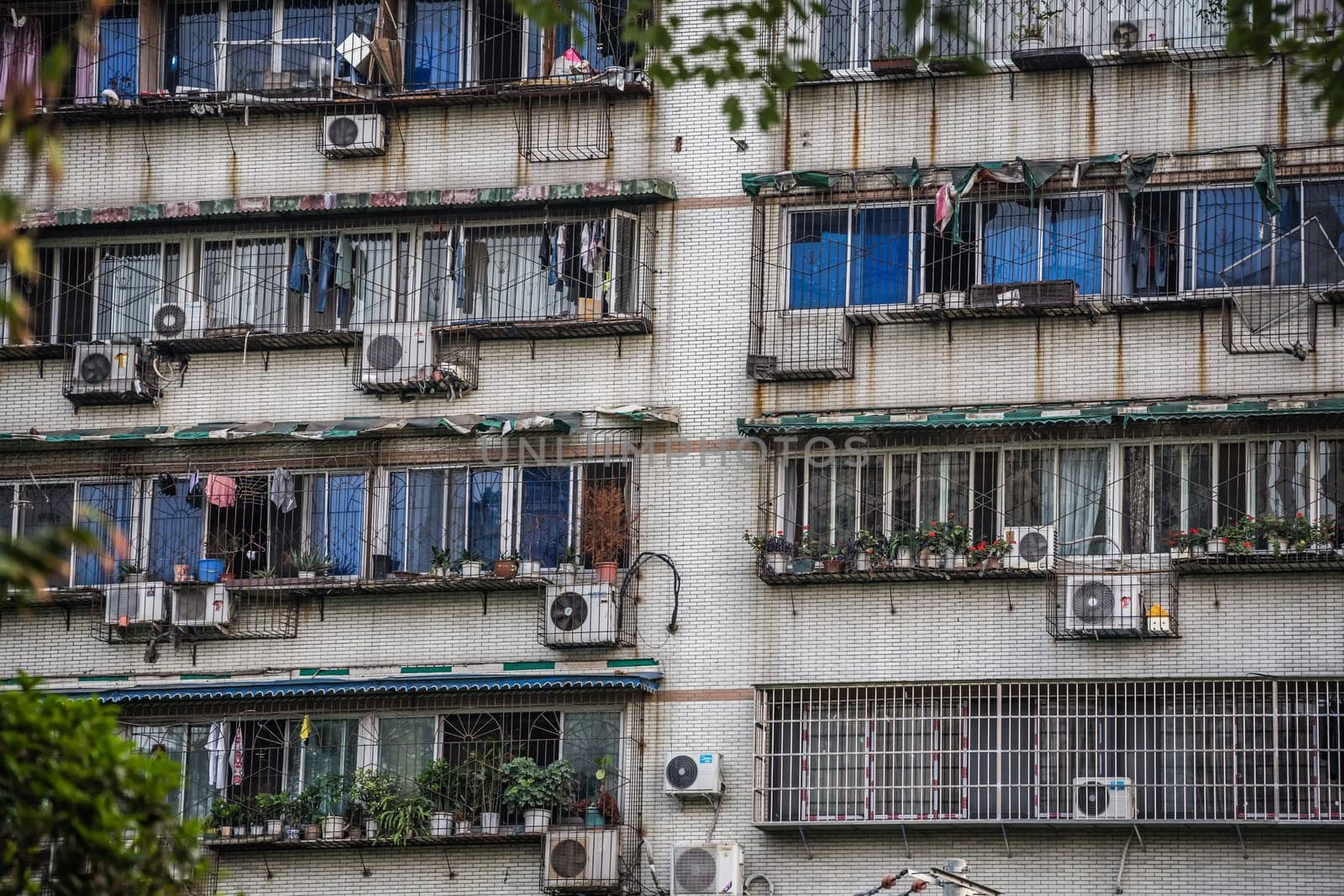 Windows and balconies of old residential buildings and blocks of flats in Chengdu, China