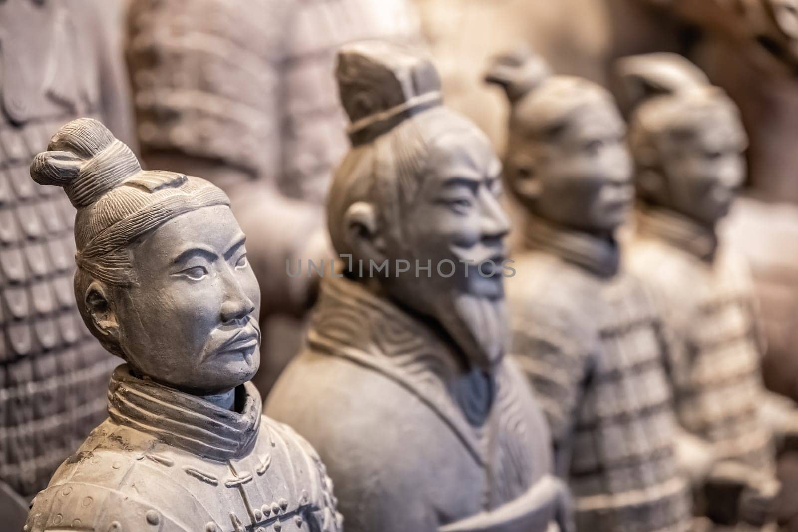 Xian, China -  July 2019 :  Souvenir mini small figurines of the clay soldiers of the army of terracota warriors for sale in a gift shop, Shaanxi Province