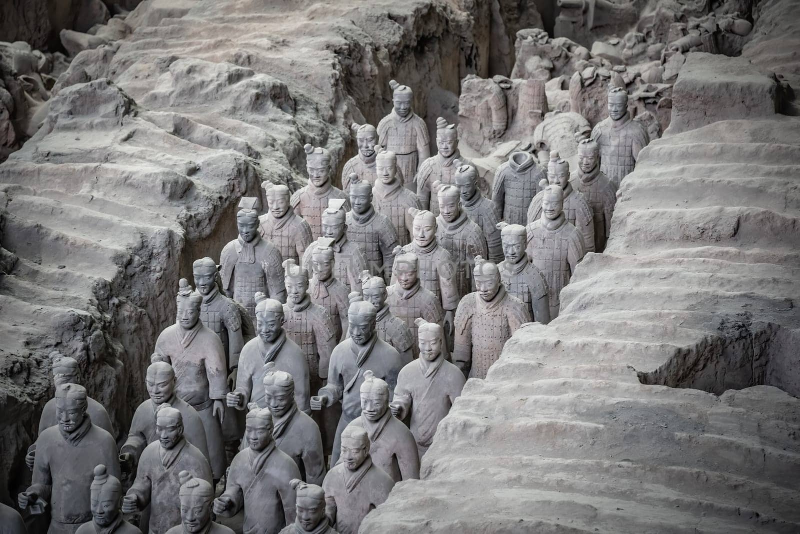 Xian, China -  July 2019 :  Standing clay soldiers forming part of an army of terracota warriors, created during the reign of first chinese emperor Qin Shi Huang Di, Shaanxi Province