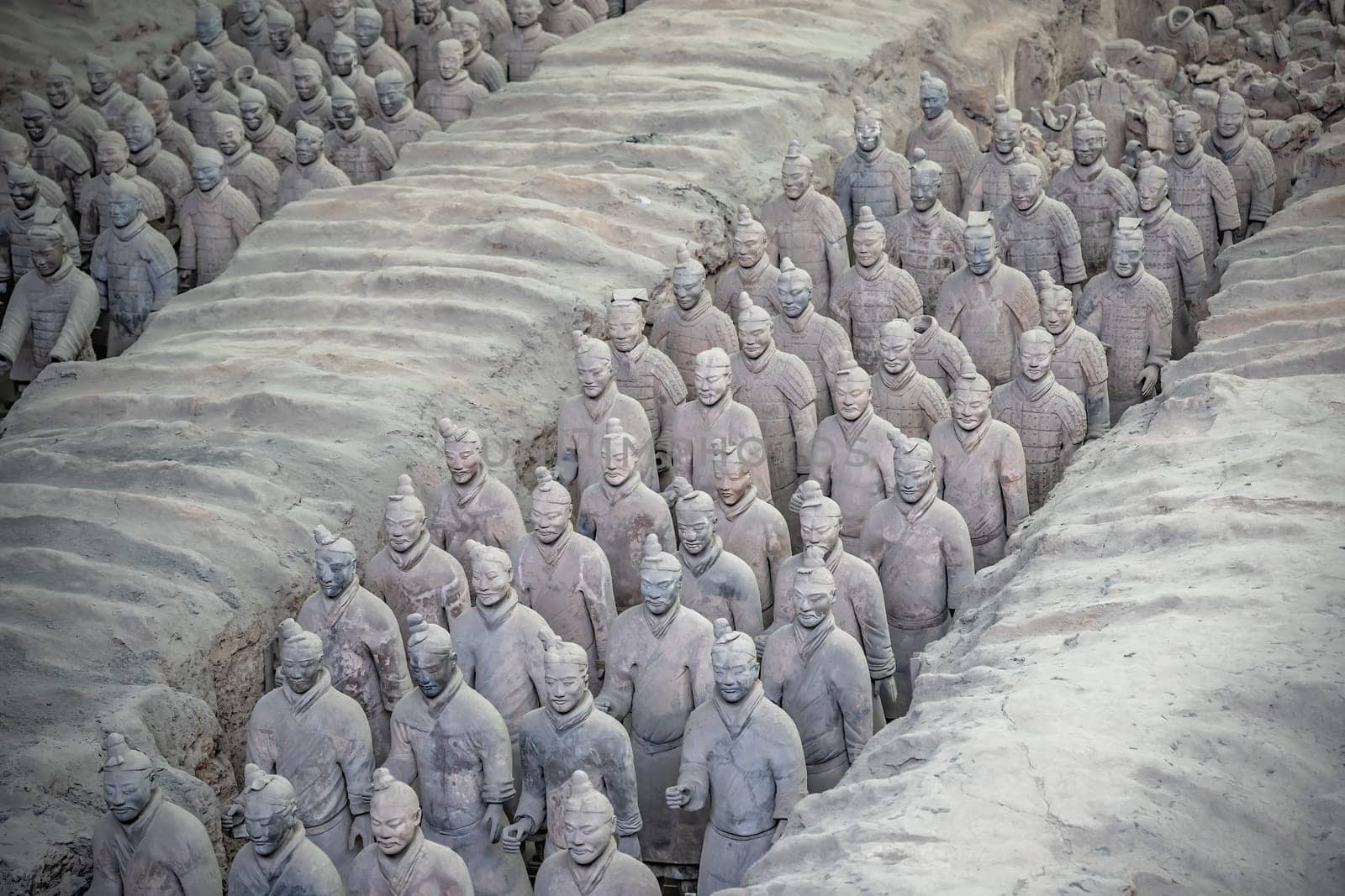 Xian, China -  July 2019 :  Standing clay soldiers forming part of an army of terracota warriors, created during the reign of first chinese emperor Qin Shi Huang Di,Shaanxi Province