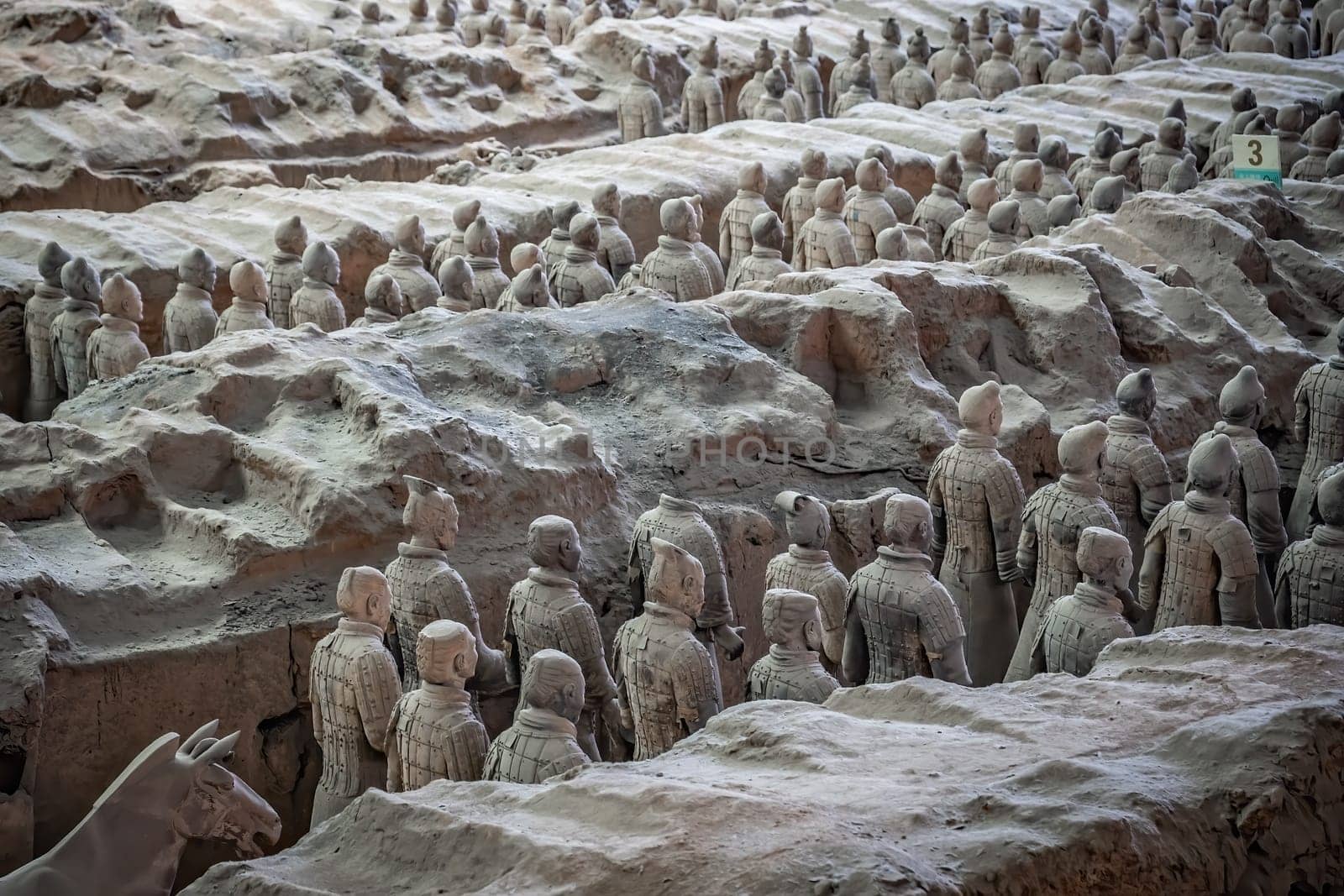 Xian, China -  July 2019 : An army of terracota clay soldiers, created during the reign of first chinese emperor Qin Shi Huang Di, Xian, Shaanxi Province
