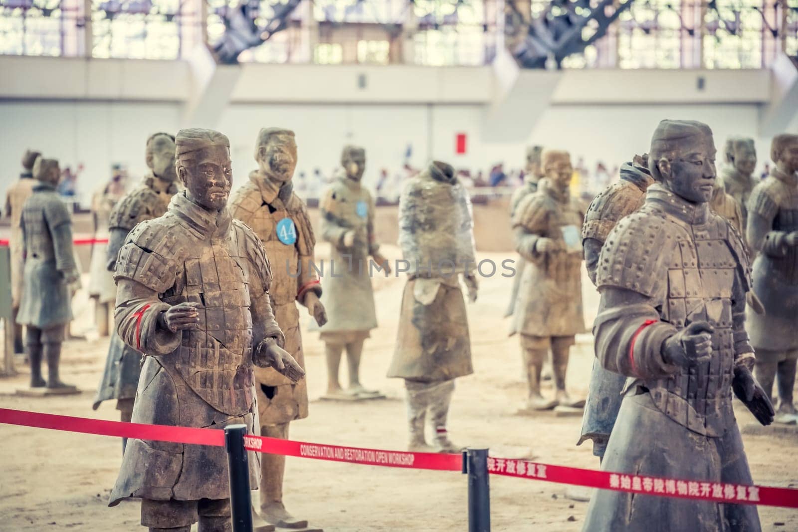 Xian, China -  July 2019 : Standing clay soldiers forming part of an army of terracota warriors, created during the reign of first chinese emperor Qin Shi Huang Di, Xian, Shaanxi Province