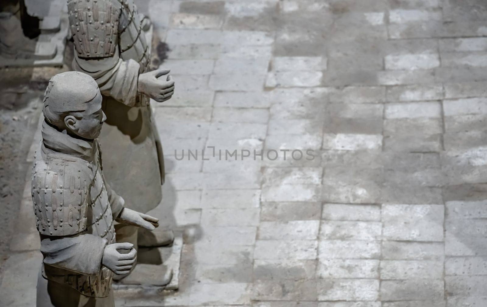 Xian, China -  July 2019 :  Standing clay soldiers forming part of an army of terracota warriors, created during the reign of first chinese emperor Qin Shi Huang Di, Shaanxi Province