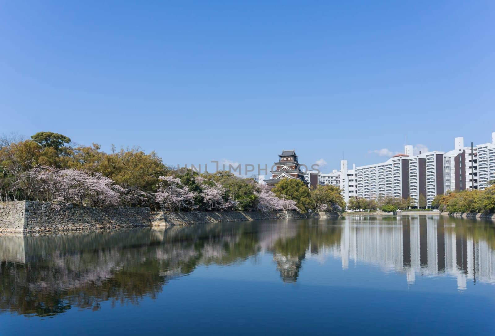 Hiroshima Castle is a castle in Hiroshima, Japan. It was constructed in the 1590s, but was destroyed by the atomic bombing on August 6, 1945. It was rebuilt in 1958, a replica of the original that now serves as a museum of Hiroshima's history before World War II.