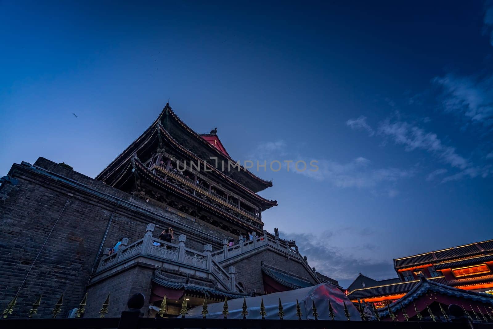 Xian, China -  July 2019 : Landmark Xian Bell Drum Tower photographed at dusk, Shaaxi Province