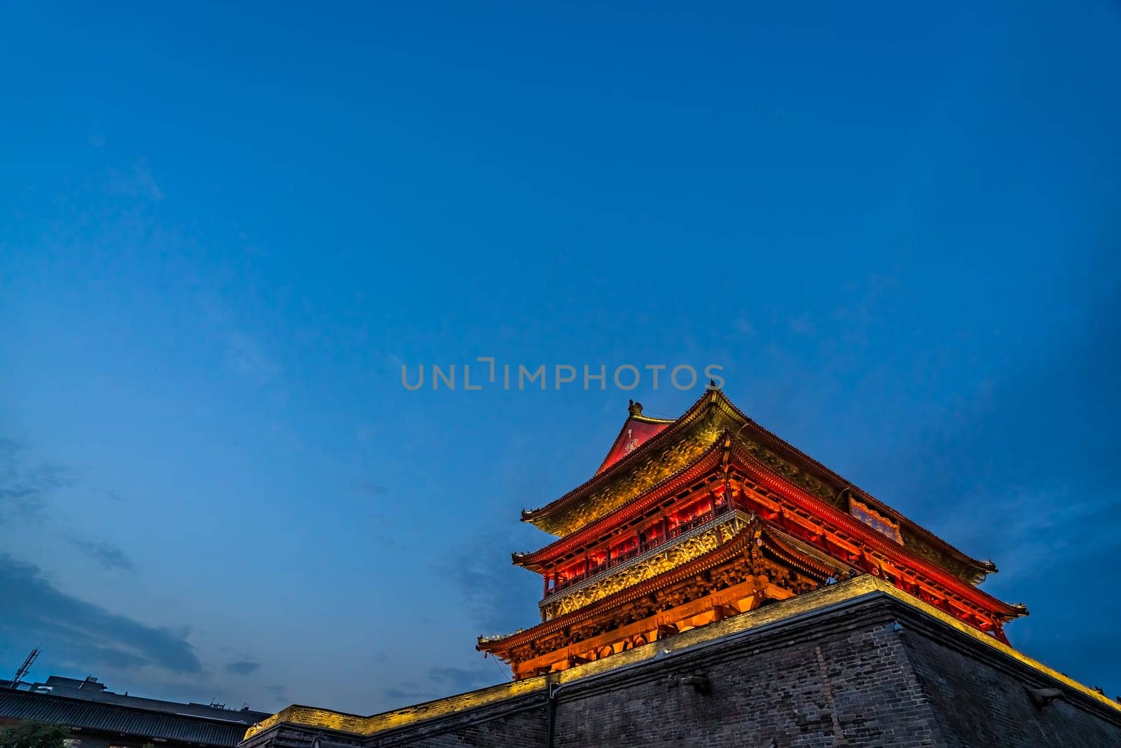 Xian, China -  July 2019 : Bell Drum Tower beautifully lit and illuminated at night, Shaaxi Province, Central China