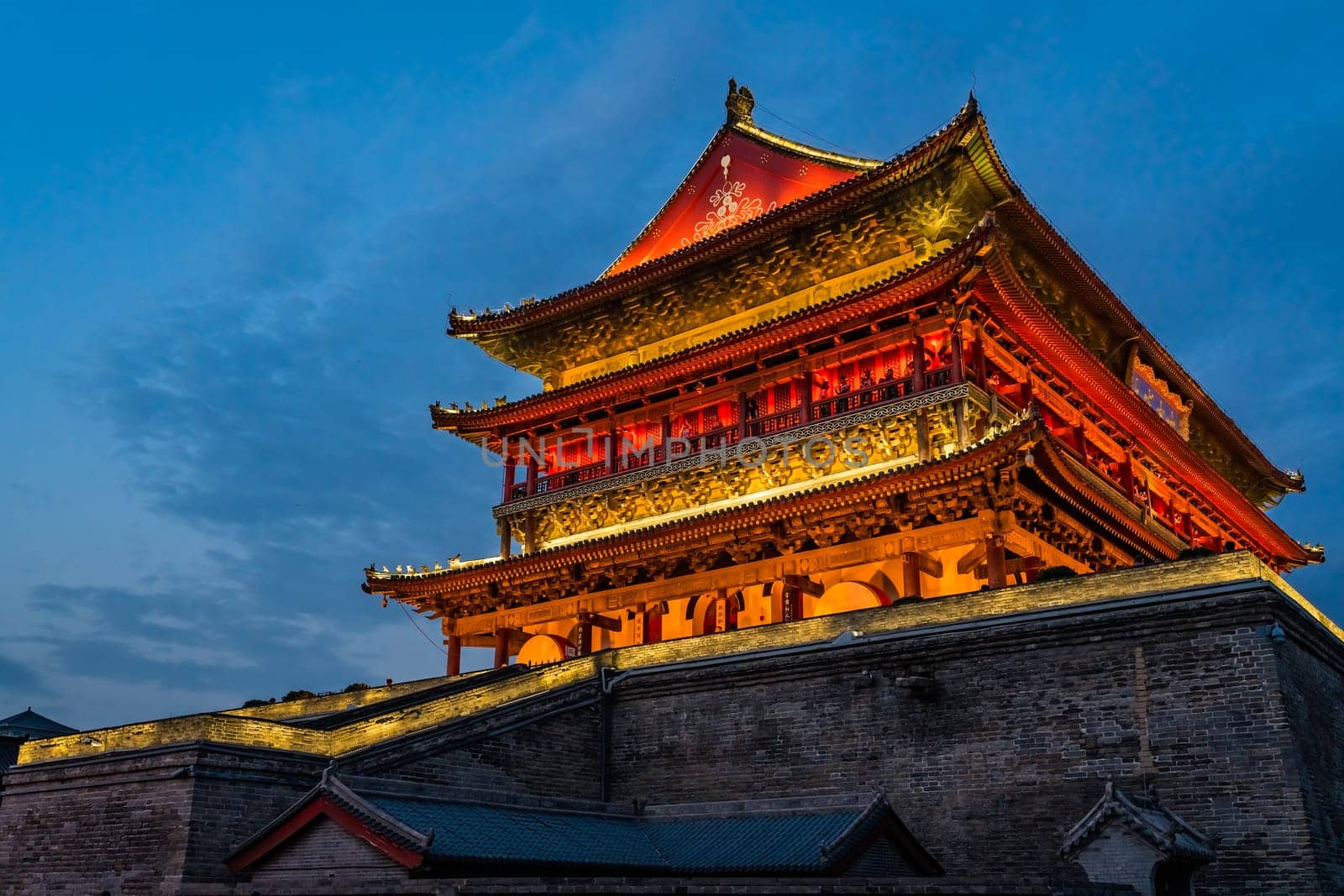 Xian, China -  July 2019 : Xian Bell Drum Tower beautifully lit and illuminated at night, Shaaxi Province