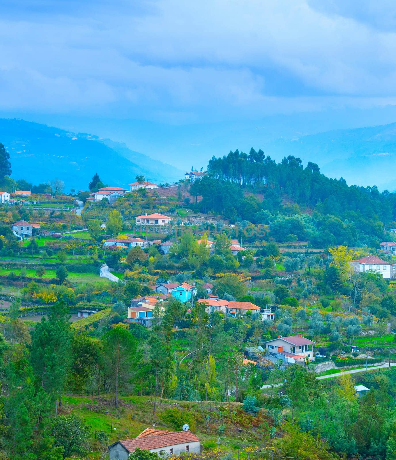 View of Douro river valley villages in rainy weather. Portugal