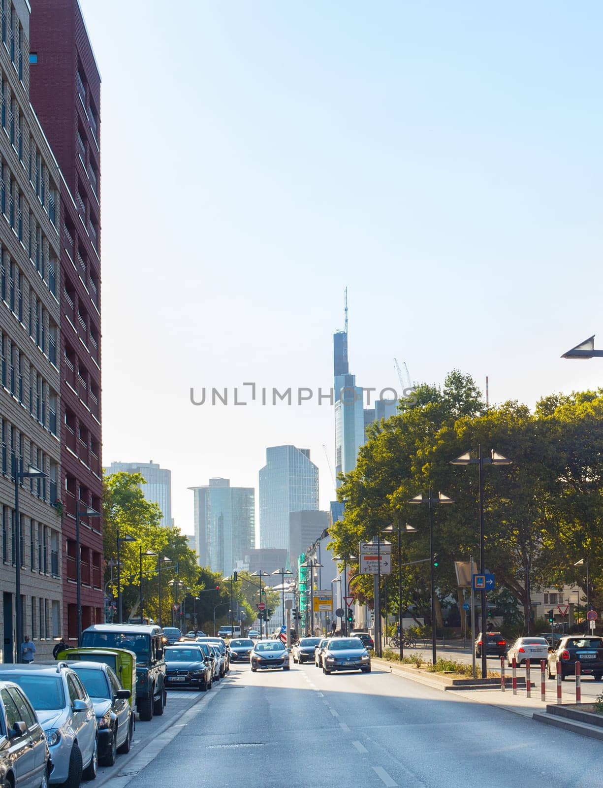 FRANKFURT, GERMANY - SEPTEMBER 01, 2018: Traffic on the road to city center in Frankfurt. Business Downtown in the background