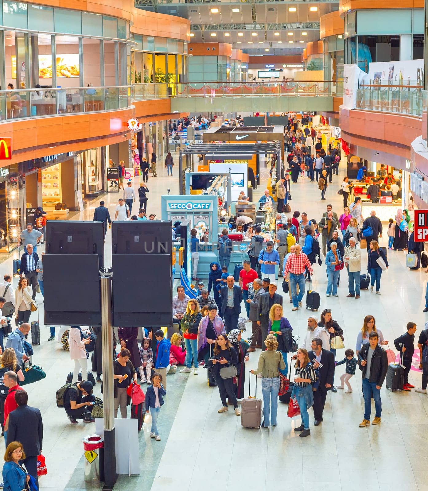 ISTANBUL, TURKEY - MARCH 16, 2017: Interior of Departure hall in Sabiha Gokcen International Airport. More than 32 million tourists visit Turkey a year.