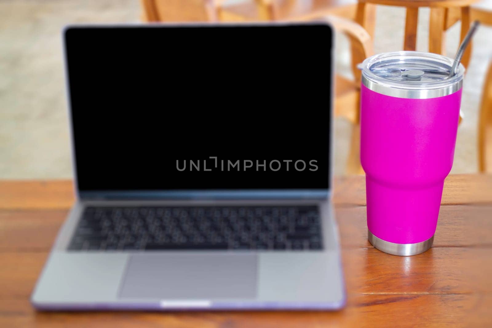 Online wireless device on wooden table, stock phto