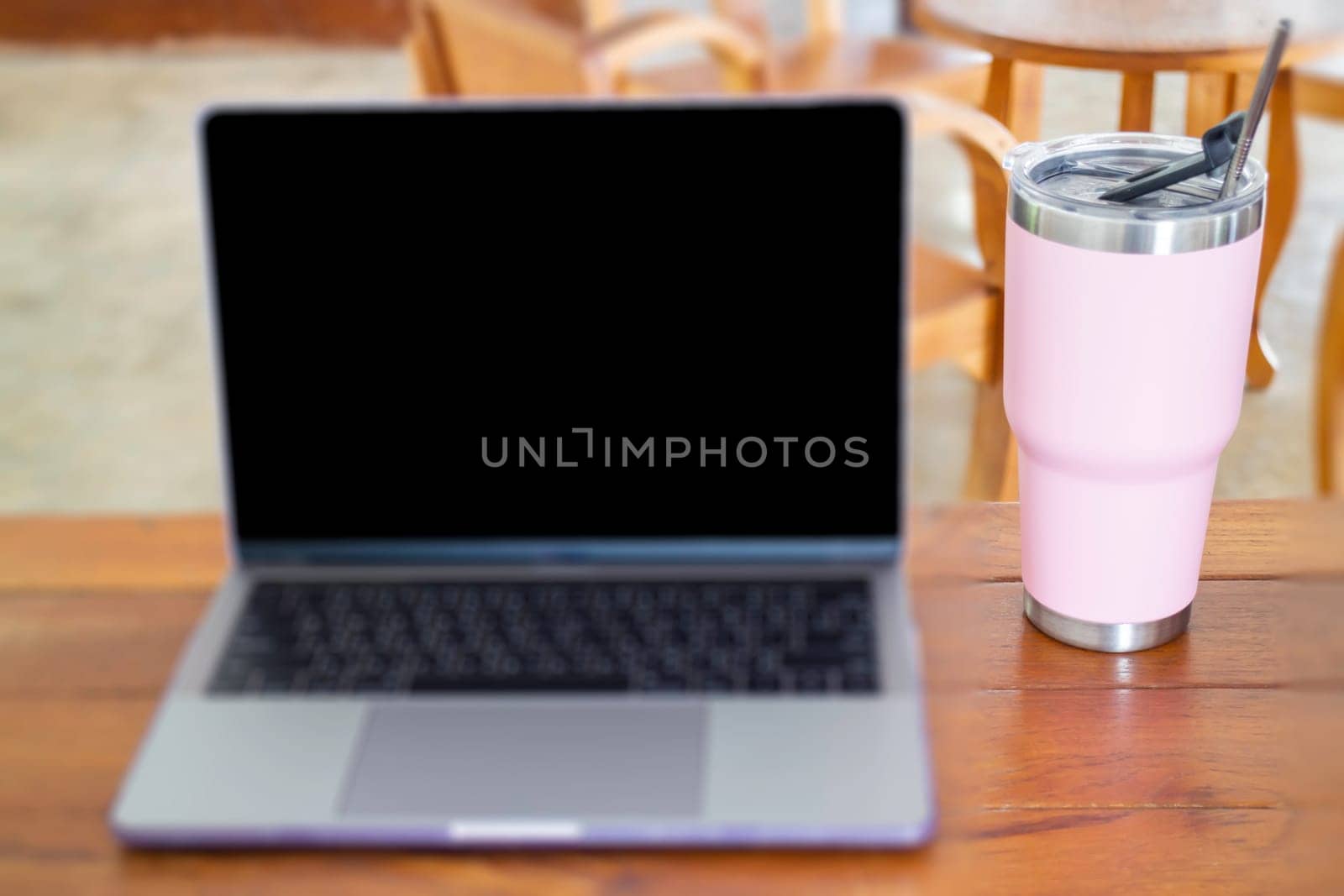 Online wireless device on wooden table, stock phto