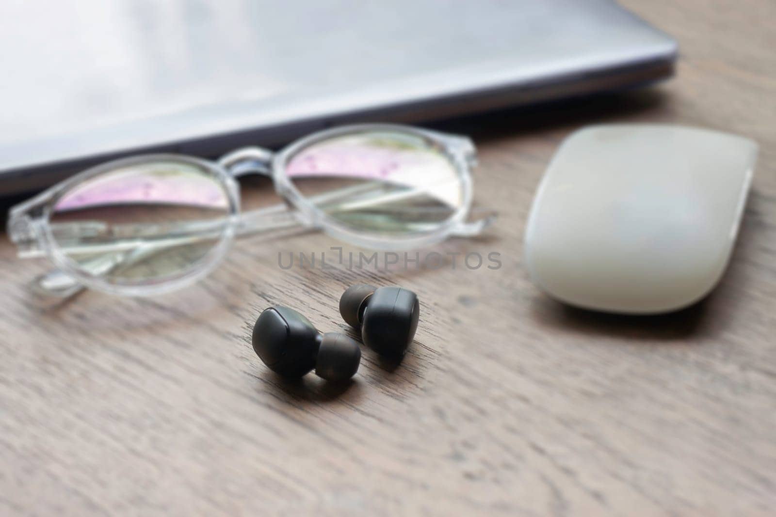 Wireless technology on wooden table, stock phto