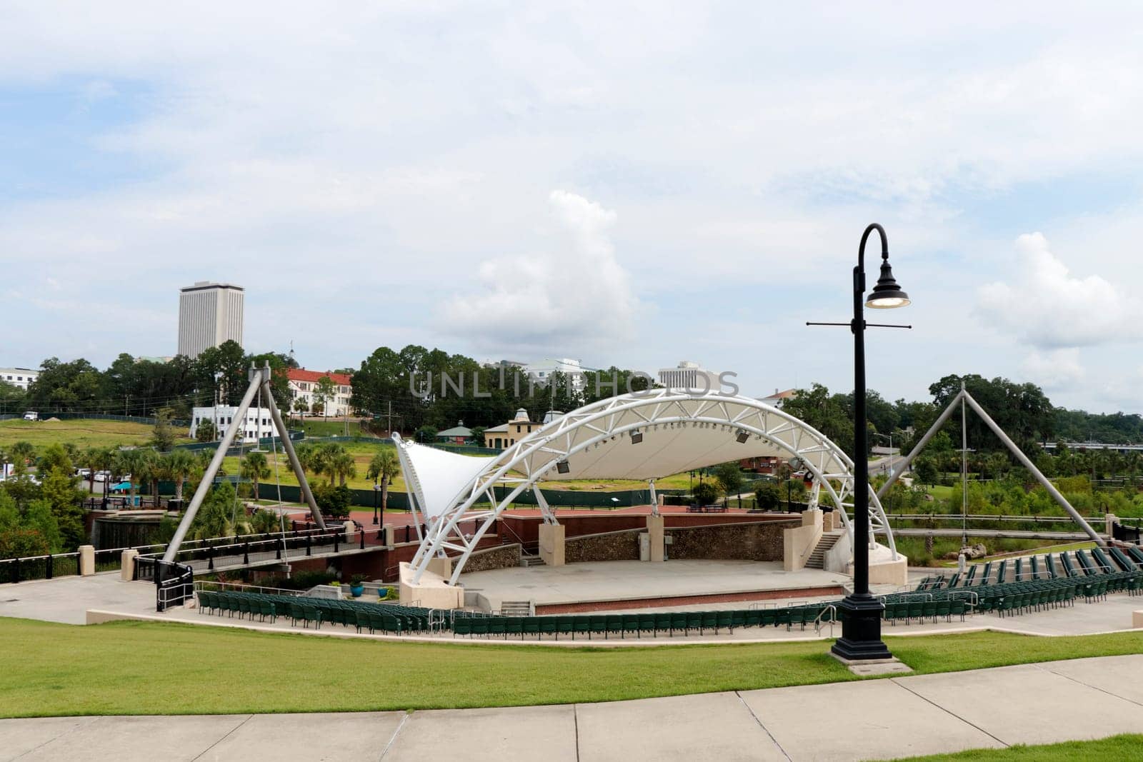 Tallahassee, FL, USA - July 15, 2018: Public Cascades park view of Capital City Amphitheater. Outdoor entertainment venue on a sunny day in Cascades park..