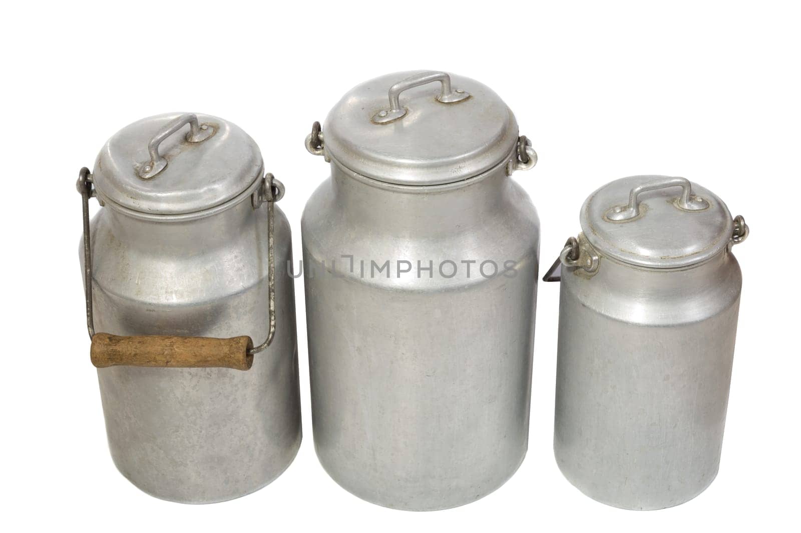 Retro aluminium milk jugs, white background. Vintage milk cans isolated on white background.