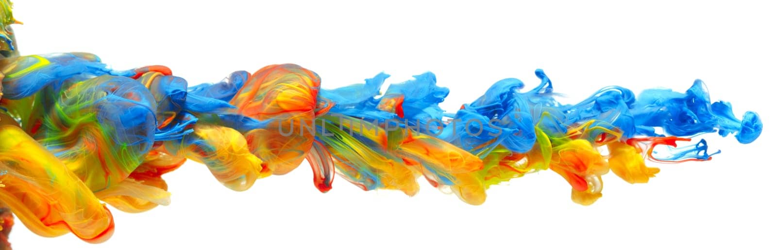 Rainbow of colorful paints and inks swirling together in flowing water abstract background