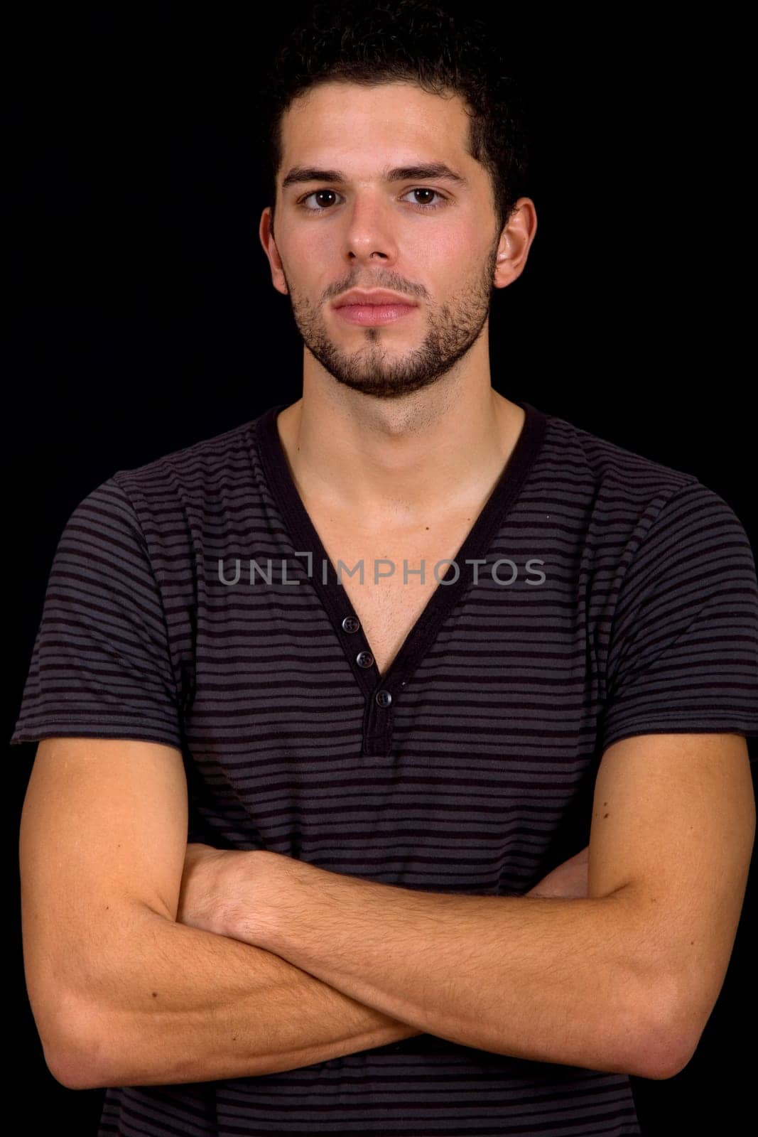 young man portrait, on a black background