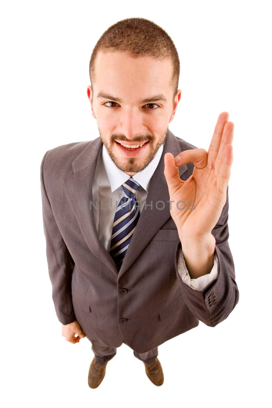 happy young businessman full length winning, isolated
