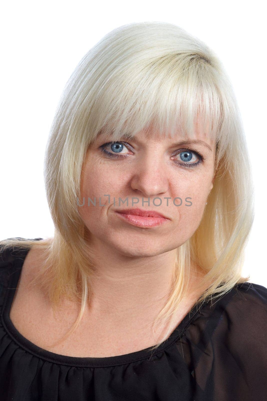 A blond woman in dark clothing on white background