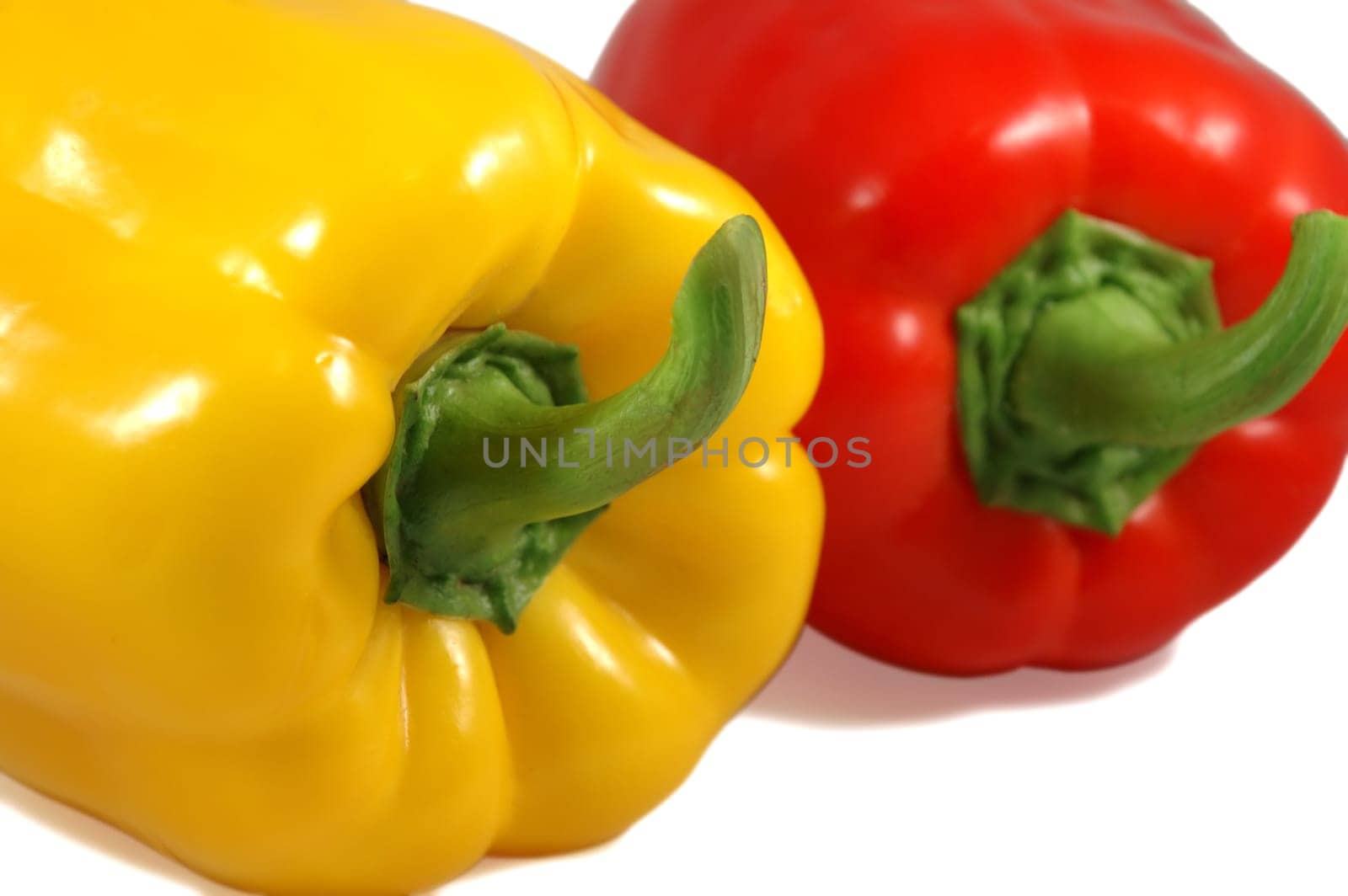 The close up picture of isolated papricas over white