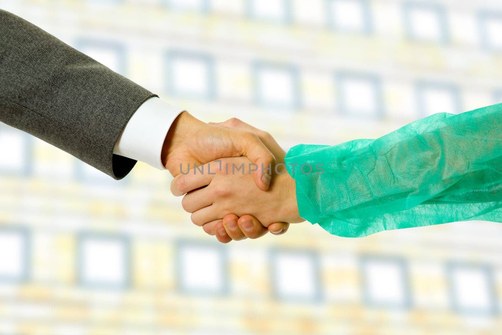 Business men and doctor hand shake, close up