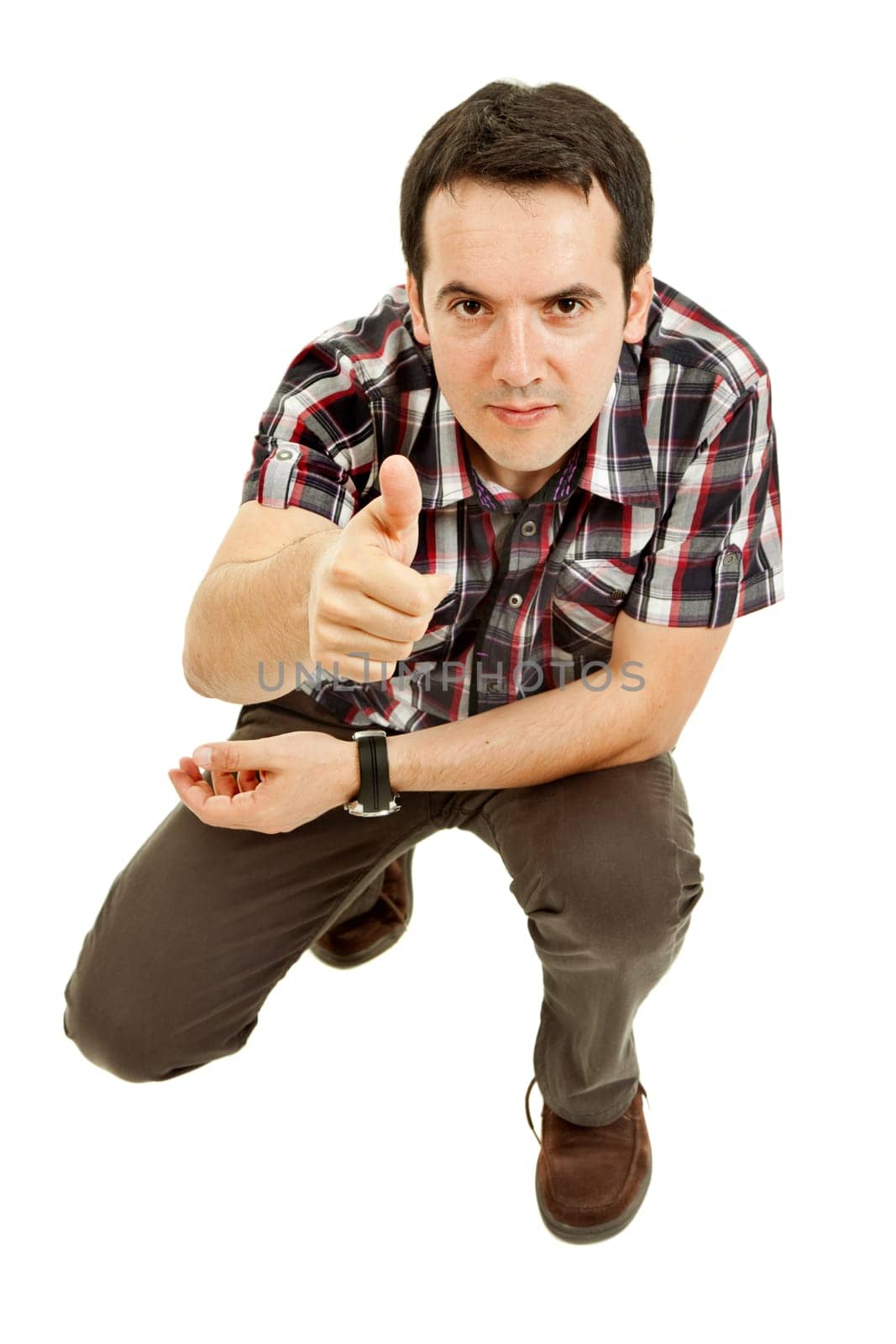young casual man going thumb up, isolated on white