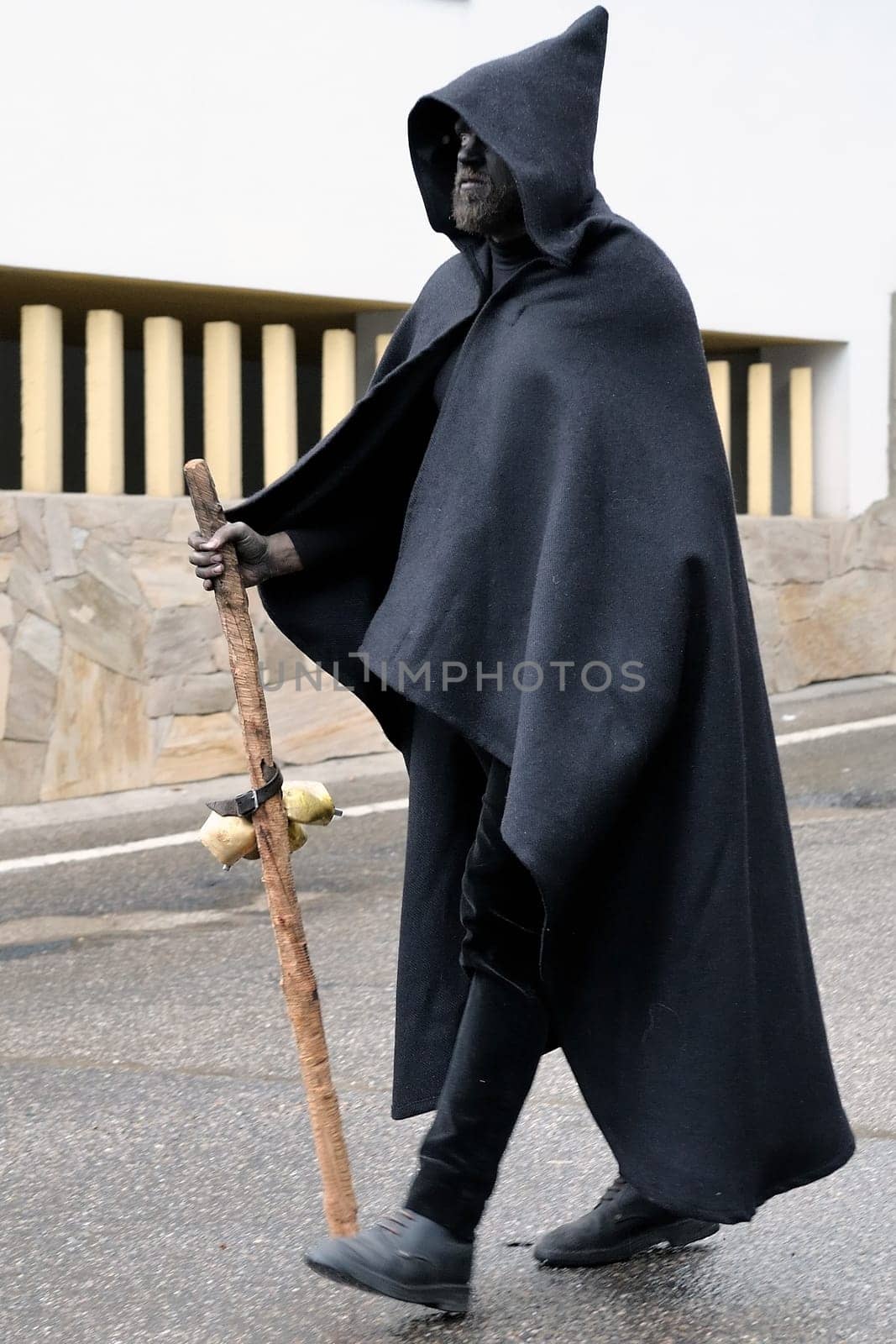 Orani, Sardinia, Italy - February 15, 2015: Parade of traditional masks of Sardinia during the Carnival 2015 in Orani.