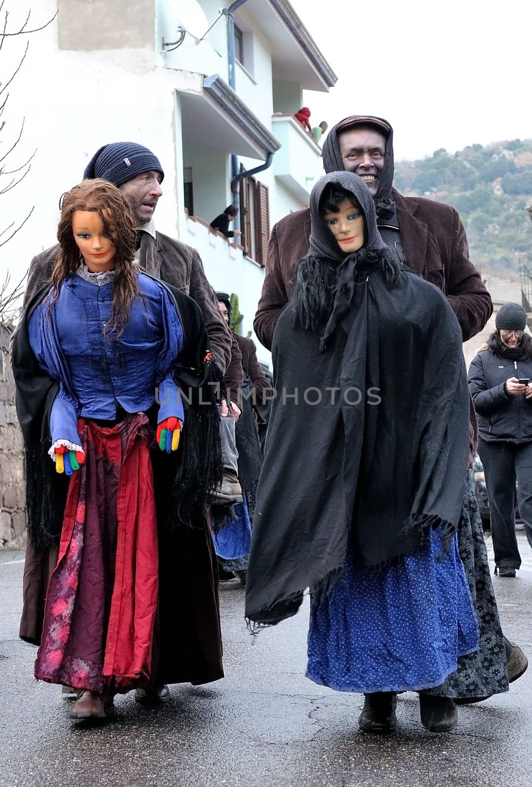 Orani, Sardinia, Italy - February 15, 2015: Parade of traditional masks of Sardinia during the Carnival 2015 in Orani.