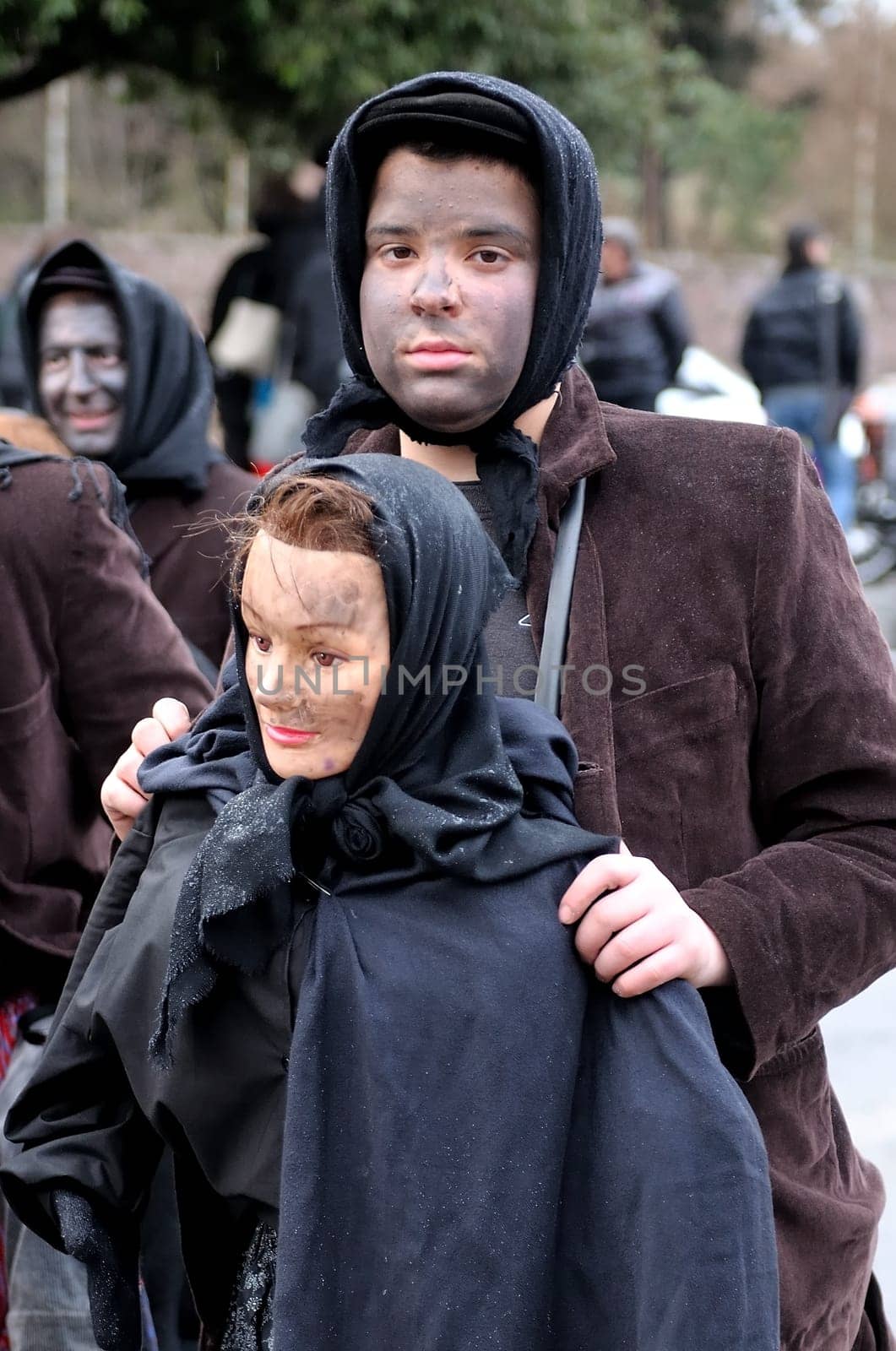 Orani, Sardinia, Italy - February 15, 2015: Parade of traditional masks of Sardinia during the Carnival 2015 in Orani.