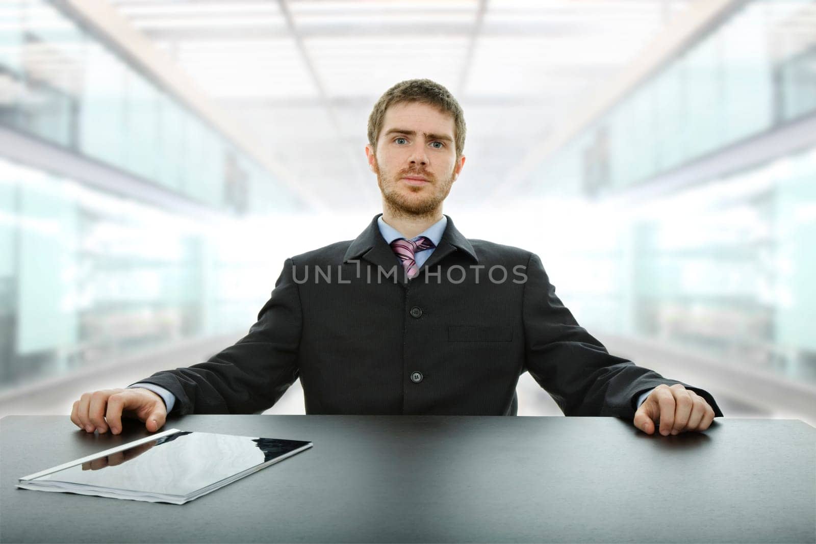 young business man on a desk at the office