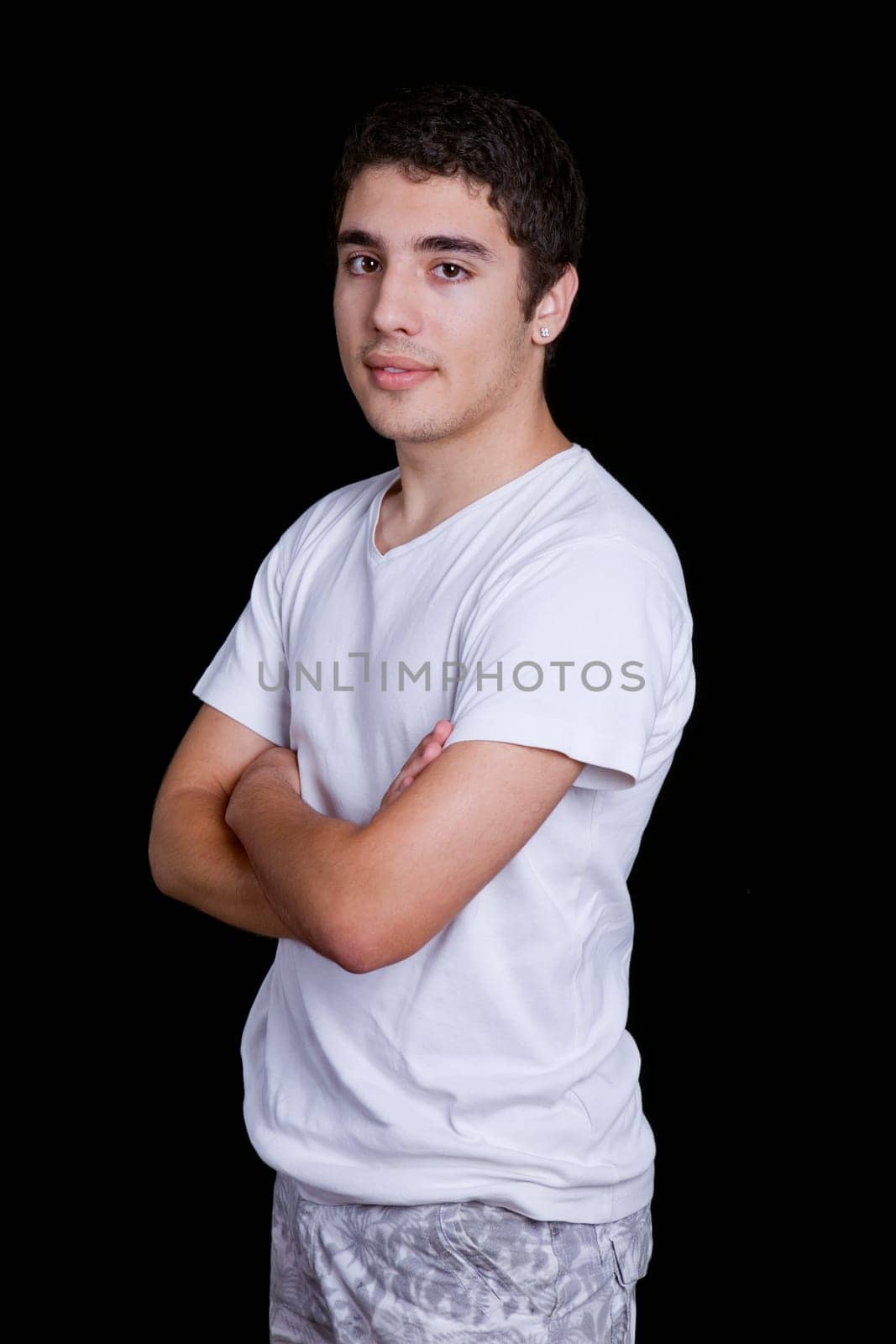 young casual happy man on a black background