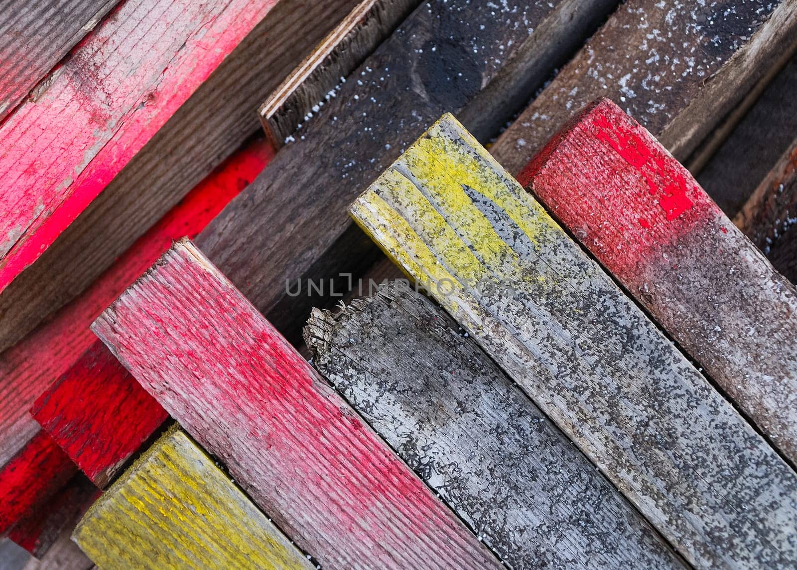 Colorfully painted wooden stoecke