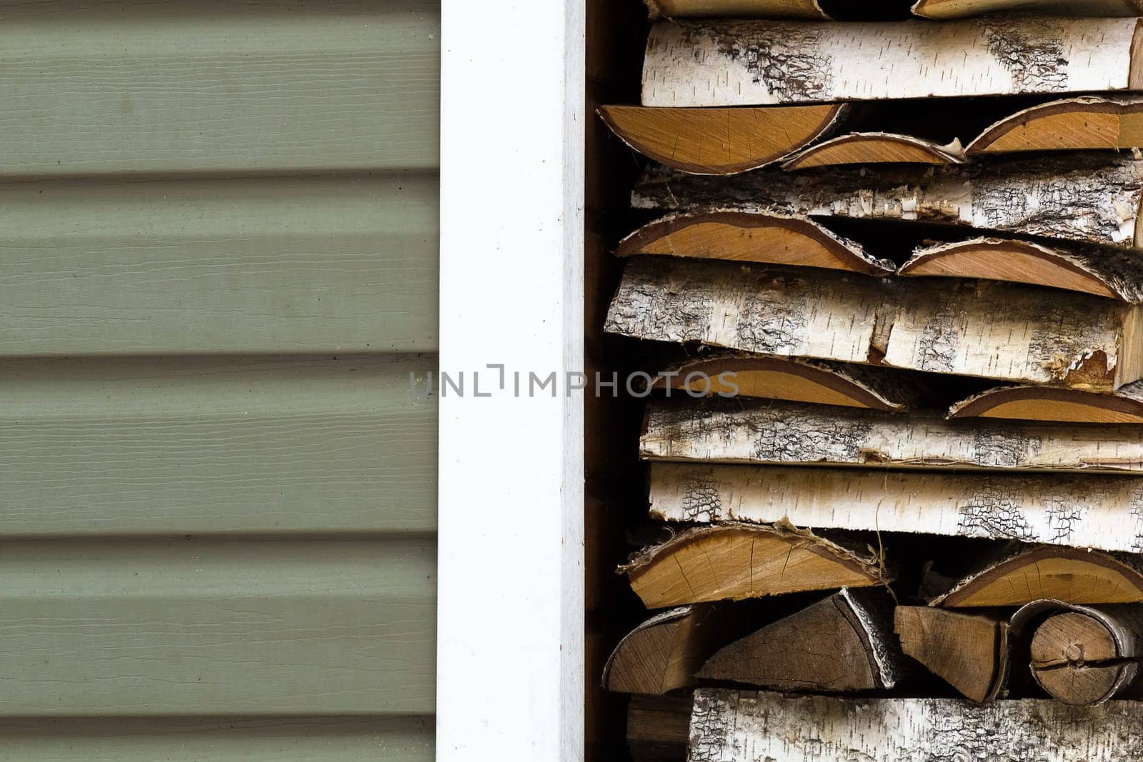 fuelwood for the winter. Pile of birch firewood