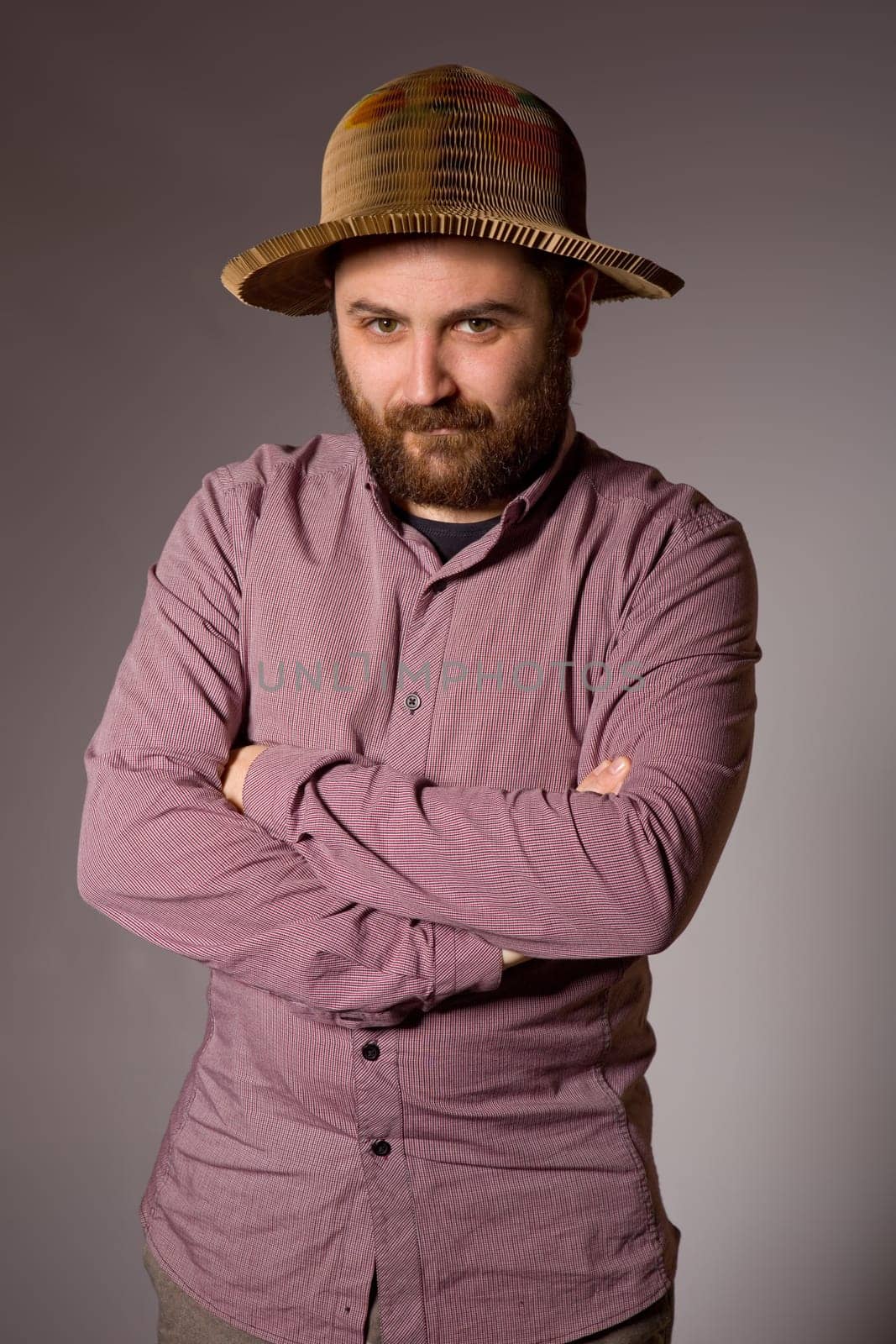 young casual man portrait in a dark background