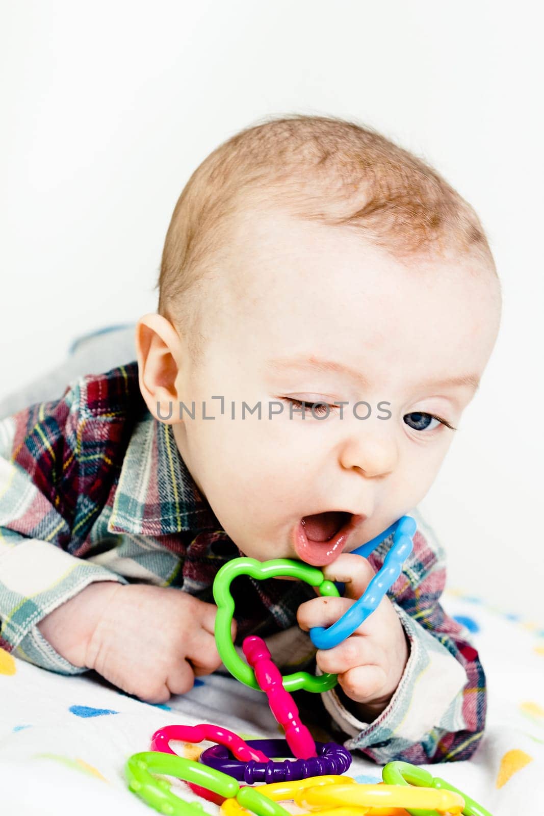Adorable funny baby with blue eyes. studio photo