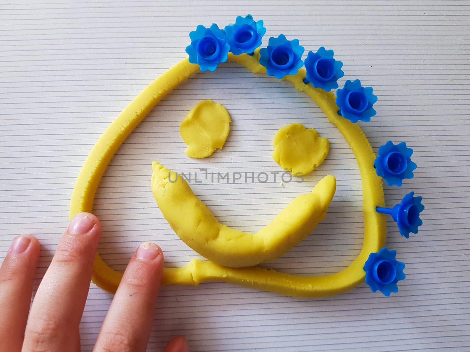 Fanny face made of a modeling clay. Made by child.