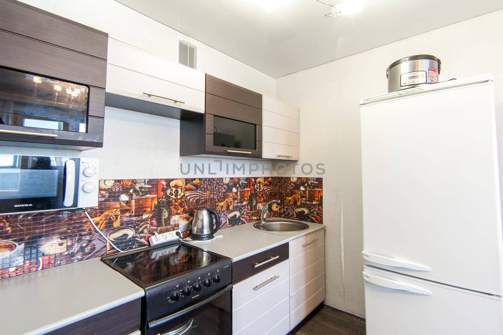 Russia, Moscow- May 12, 2018: interior room apartment. standard repair decoration in hostel. kitchen and dining room