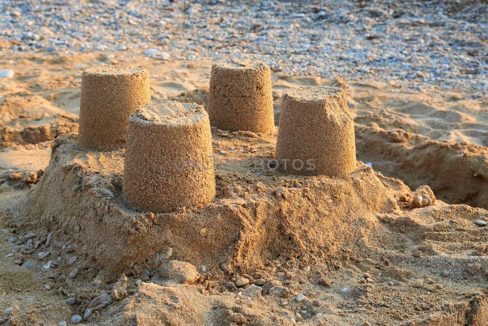 Towers from sand - castle on the beach