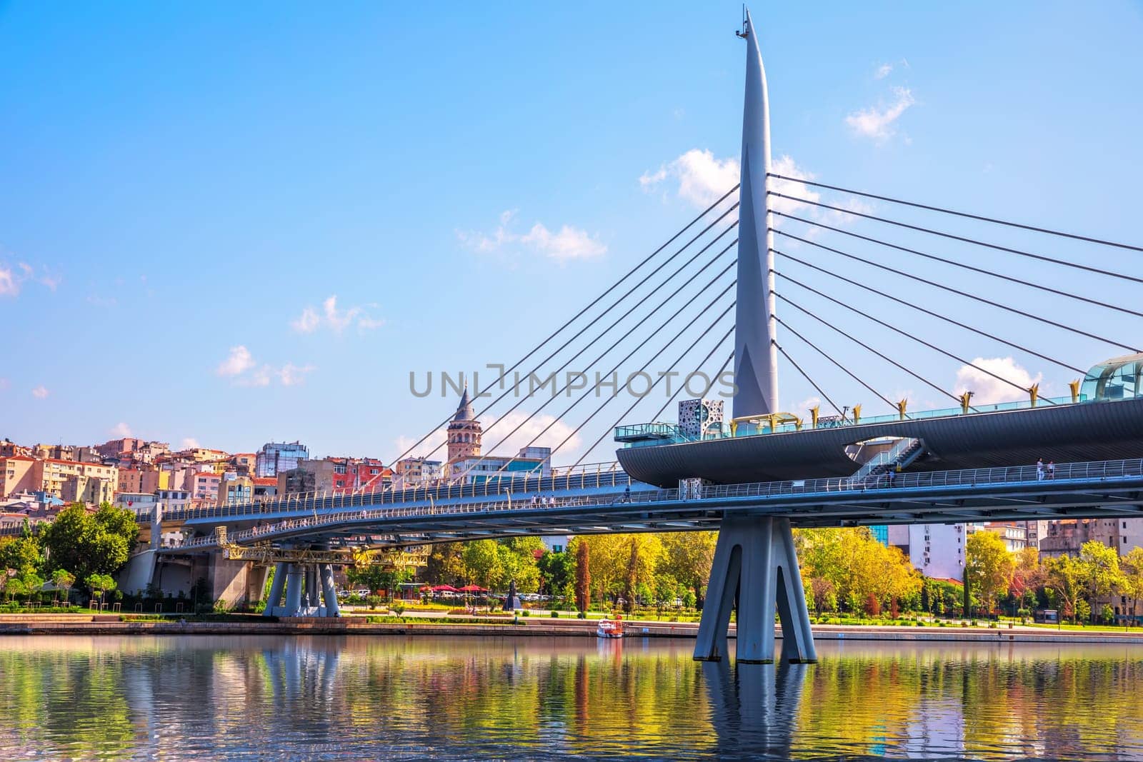 Halic Bridge over the Golden Horn and the Galata Tower, Istanbul, Turkey.