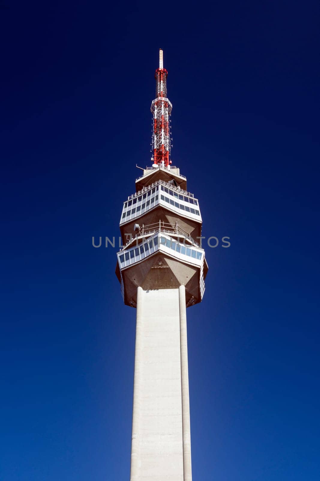 Avala tower in Belgrade city in Serbia is a touristic destination, dark blue sky background.
