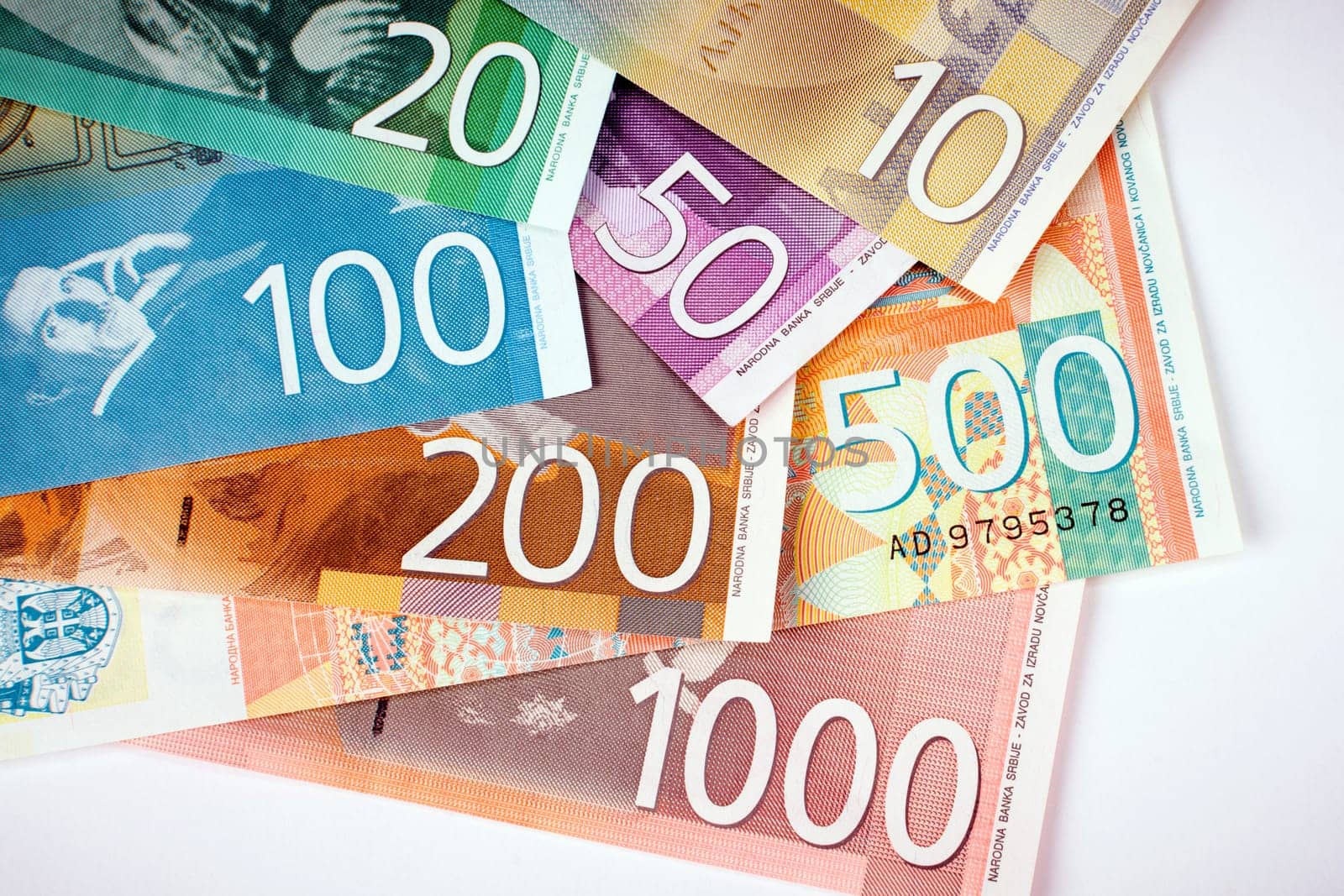 Serbian dinar banknotes paper currency on white background.