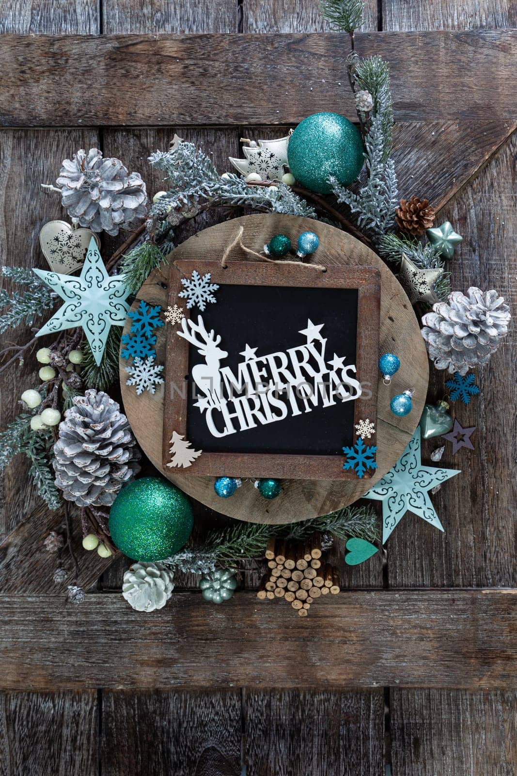 Festive decorations for a cheerful Christmas season on a wooden background