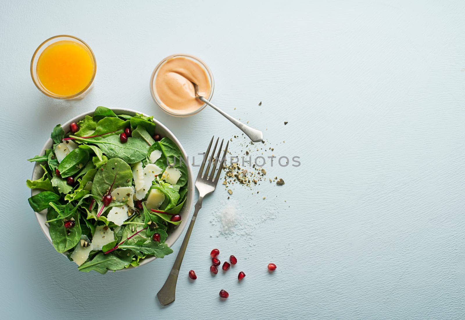 Healthy green salad with spinach and seeds. Home made meal. Concept for a tasty and healthy meal.
