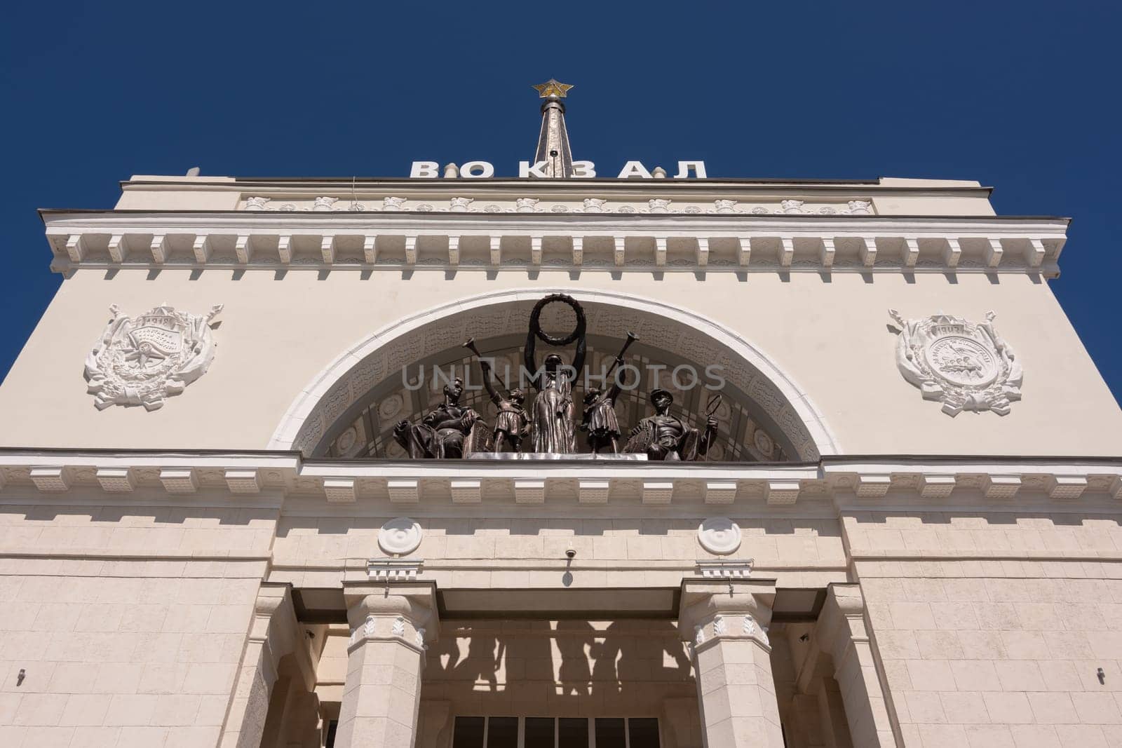 Volgograd, Russia - August 26, 2019: The architectural ensemble above the main entrance to the building of the Volgograd 1 railway station, Volgograd region of the Volga railway, Russia