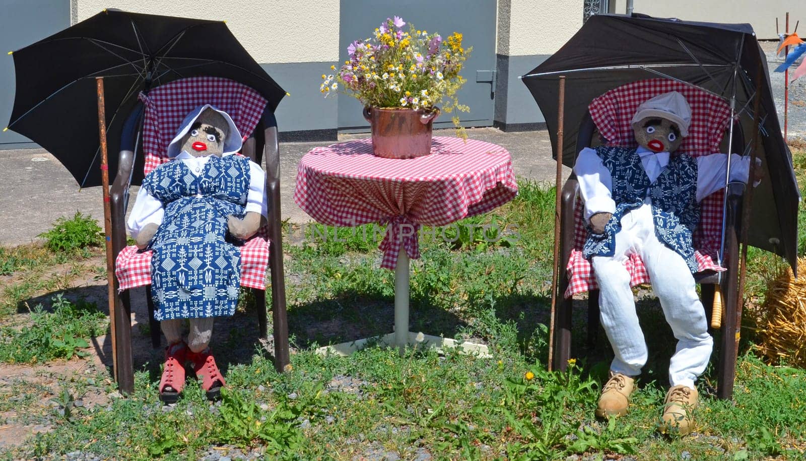 straw doll in costume