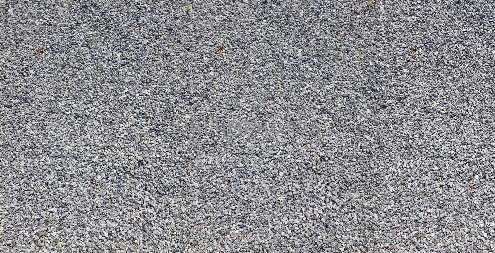 Close-up of a picture with gravel stones, pebbles as a background