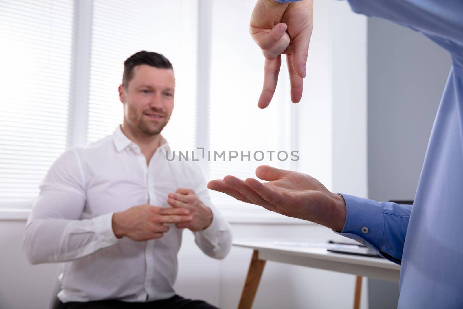 Two Hearing Impaired Friends Using Sign Language For Communication